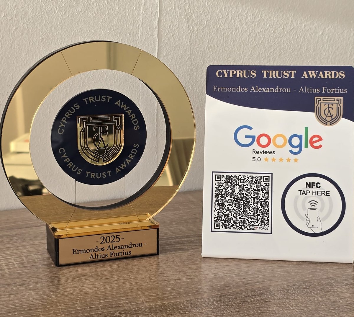 Cyprus Trust Awards 2025 trophy and Google reviews card for Ermondos Alexandrou, Altius Fortius